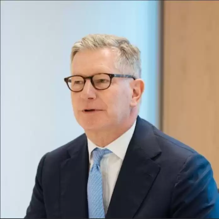 A close up of a man in business dress.