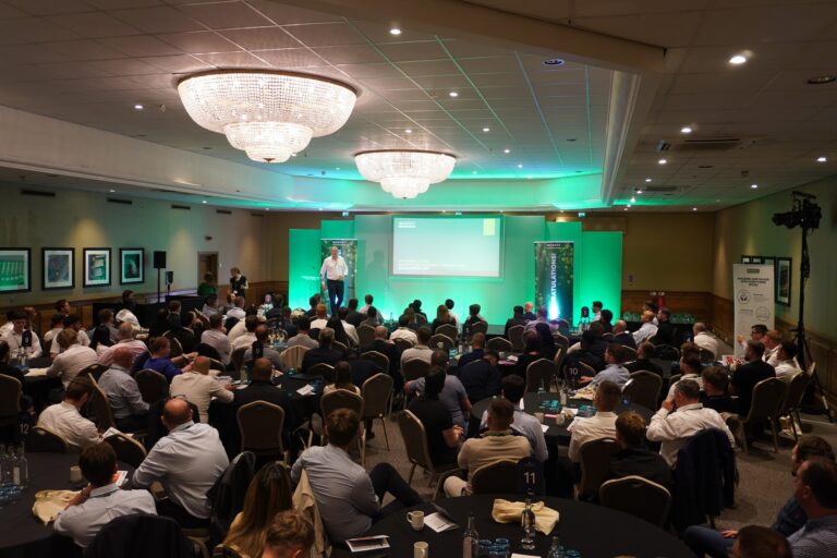 A Murphy employee presenting to the emerging talent and learning and development cohorts in a hotel function room.