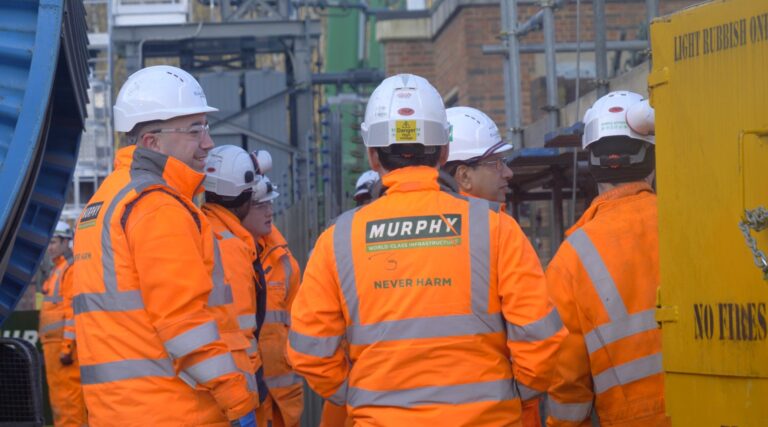 A group of Murphy employees wearing safety equipment at the West Byfleet Primary Substation.