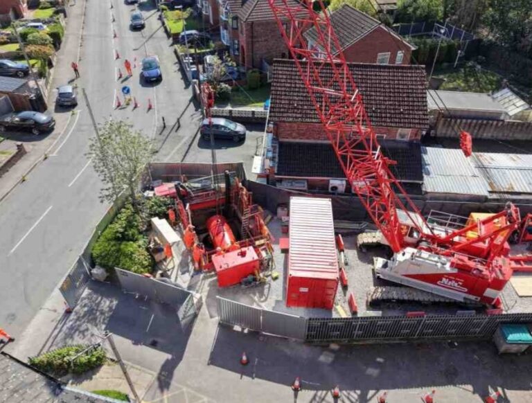 A picture looking down on some heavy machinery used to lessen the risk of flooding at Peel Green.