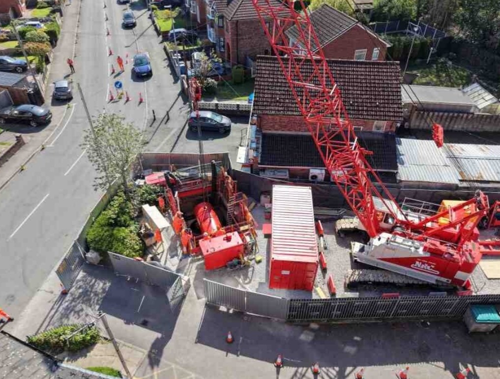 A picture looking down on some heavy machinery used to lessen the risk of flooding at Peel Green.